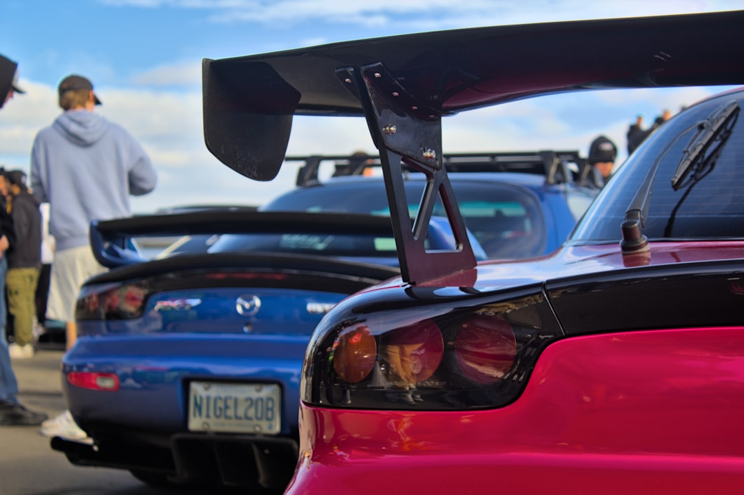 a group of cars parked next to each other